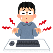 パソコンで手を痛めている人の画像