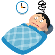 不眠症になって寝つけない男性の画像