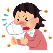 くしゃみをしている女性の画像